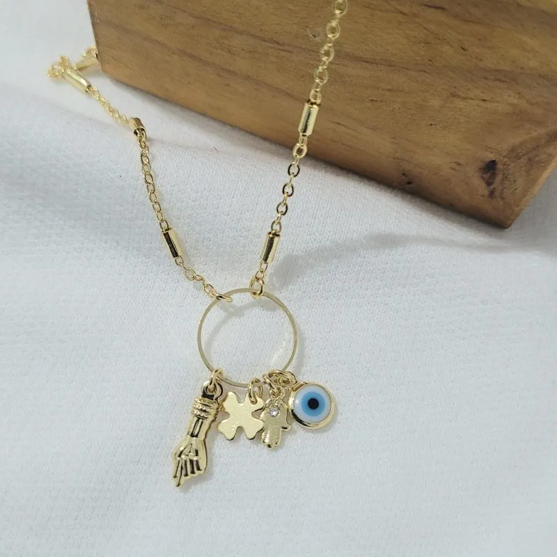 colar ouro olho grego mão de fatima trevo e figa