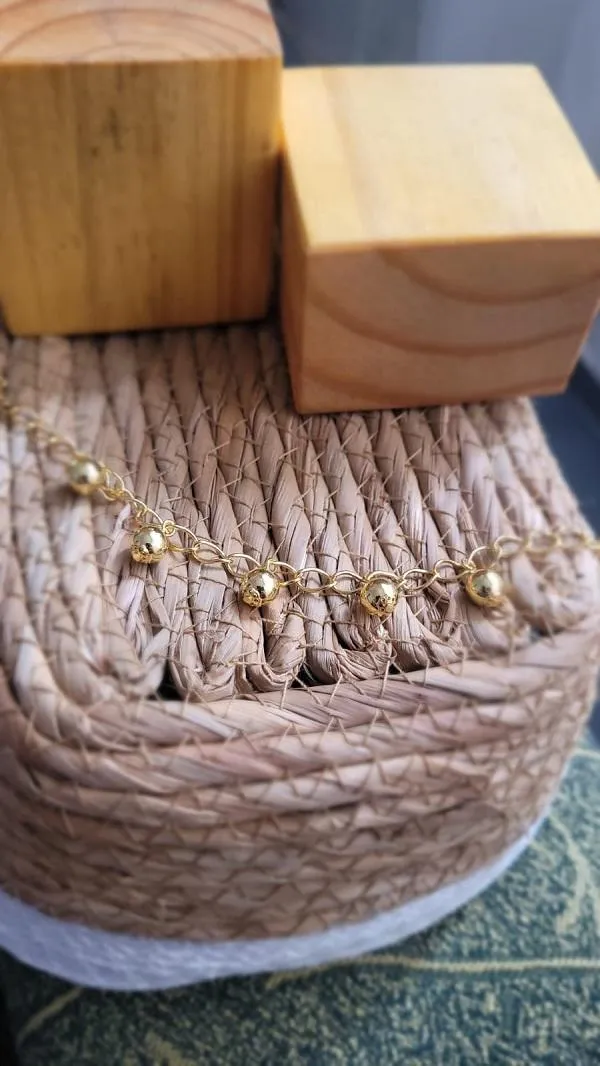 pulseira ouro bolinhas lisas penduradas