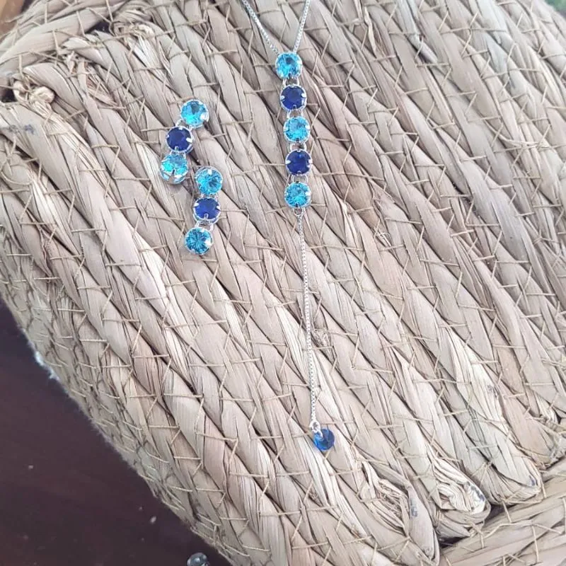 conjunto rodio pedra azul claro e azul escuro pendurado