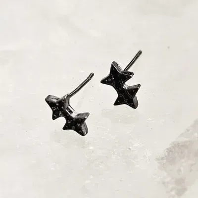 brinco rodio negro 2 estrelas 4 pontas cravejadas zirconias negras