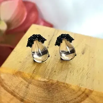 brinco rodio negro gota nude com 5 zirconias pretas na parte de cima