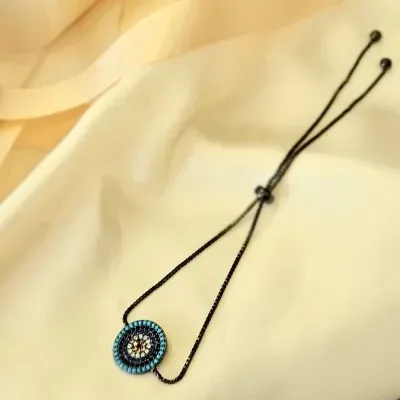 pulseira ródio negro olho grego de zirconias color com fecho chambala
