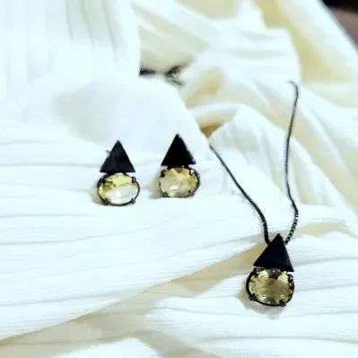Conjunto rodio negro oval deitada nude com triangulo liso em cima