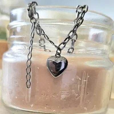 pulseira rodio negro cartier coracao liso pendurado