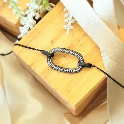 pulseira rodio negro meio elo oval grande cravejado zirconias