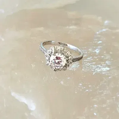 anel rodio solitario flor zirconias